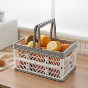 Giỏ nhựa xách tay màu trắng xám đựng trái cây trên bàn bếp