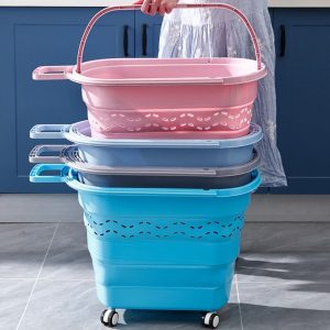 Ba giỏ kéo xếp chồng lên nhau với các màu hồng, xám, xanh dương.