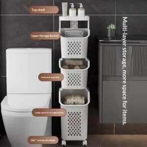 Giỏ đựng đồ ba tầng, có bánh xe, đặt trong phòng tắm cạnh toilet