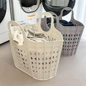 Giỏ đựng quần áo nhựa PP gấp gọn tiện lợi tiết kiệm không gian Hai giỏ đựng quần áo, một màu trắng kem và một màu xám, đang chứa quần áo.