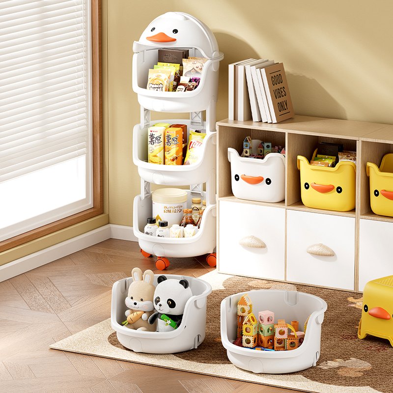 Kệ nhựa đa năng 4 tầng hình vịt đựng đồ chơi và vật dụng cho bé Kệ nhựa hình vịt màu trắng ba tầng, cạnh tủ và các hộp đựng hình vịt, đựng đồ chơi và thực phẩm.