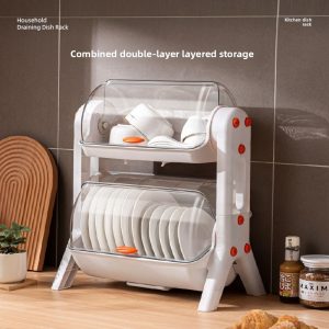 Kệ úp chén bát 2 tầng nhựa PP có nắp đậy chống bụi tiện lợi cho bếp Kệ úp chén bát 2 tầng màu trắng, đặt cạnh tường bếp, chứa nhiều chén đĩa.