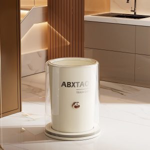 Thùng rác hai lớp với lớp ngoài trong suốt, thiết kế đẹp mắt đặt trong không gian bếp sáng sủa.