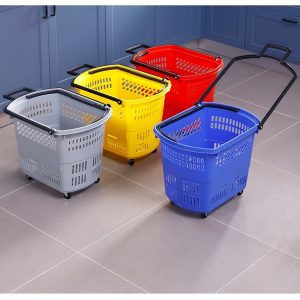Bốn giỏ kéo nhựa nhiều màu (xám, xanh, đỏ, vàng) đặt cạnh nhau.