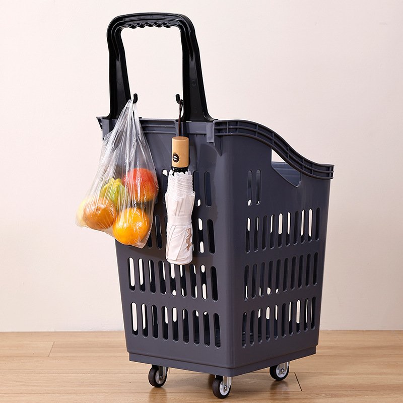 Giỏ kéo siêu thị nhựa PP cỡ lớn có bánh xe kéo tay tiện lợi Giỏ kéo siêu thị màu xám đậm, treo túi hoa quả và ô trên tay cầm.