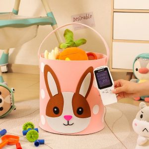 Thùng đựng đồ chơi vải nỉ màu hồng hình thỏ, có thiết bị đo kiểm tra cạnh bên.