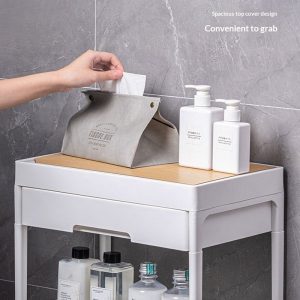 Mặt trên kệ để khăn giấy và chai lọ, tiện lợi khi sử dụng.