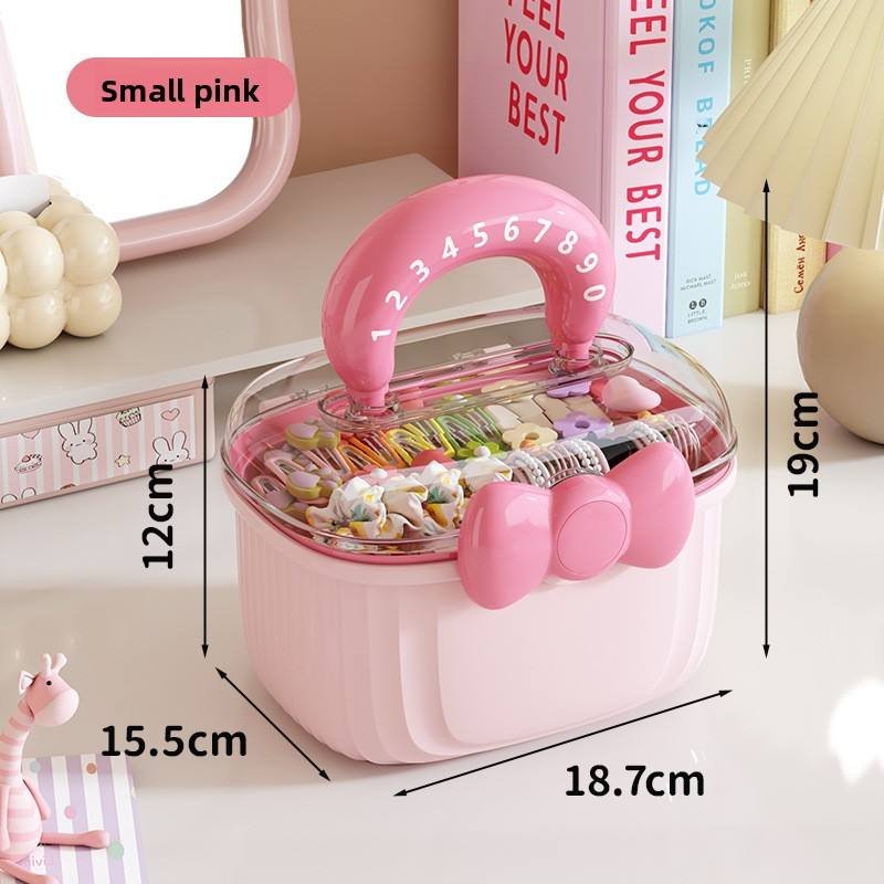 Hộp nhựa đa năng dung tích lớn đựng trang sức, mỹ phẩm cho bé gái Hộp đựng màu hồng nhỏ với kích thước 18.7x15.5x19cm, chứa nhiều kẹp tóc và phụ kiện.