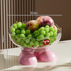 Thau nhựa trong suốt chân hồng, kích thước 24cm x 15cm, đựng đầy trái cây.